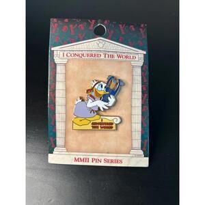 Disney Daisy Duck "I Conquered The World" pin from the 2002 "MMII Pin Series